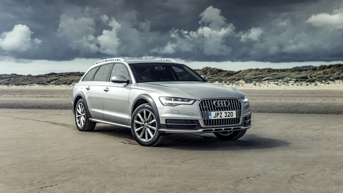Silver Audi a 4 on Brown Field Under White Clouds and Blue Sky During Daytime. Wallpaper in 1366x768 Resolution