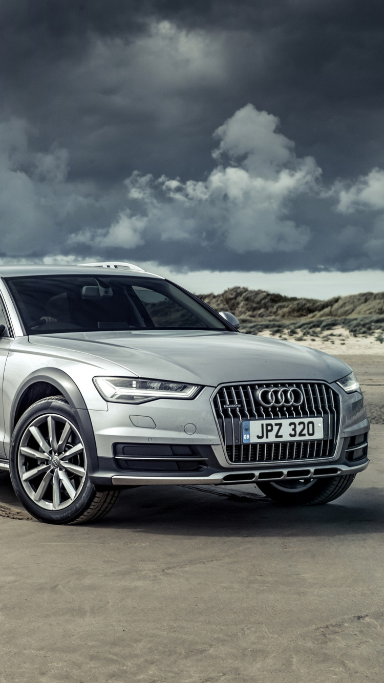 Silver Audi a 4 on Brown Field Under White Clouds and Blue Sky During Daytime. Wallpaper in 750x1334 Resolution