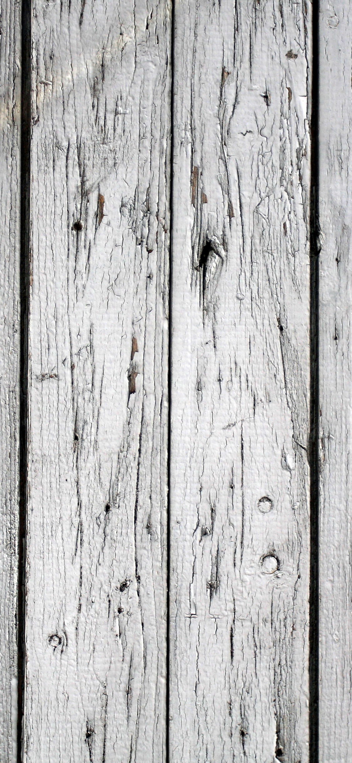 Weißes Und Braunes Holzbrett. Wallpaper in 1125x2436 Resolution