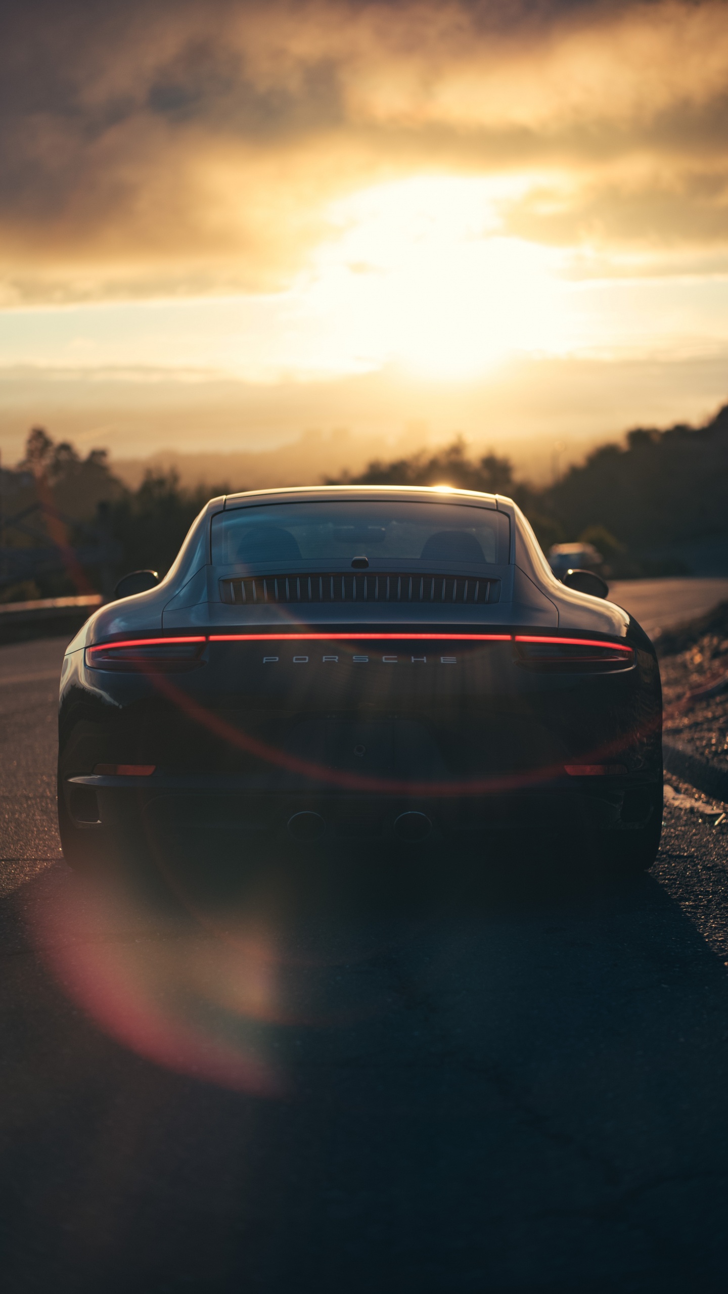 Black Car on Road During Sunset. Wallpaper in 1440x2560 Resolution