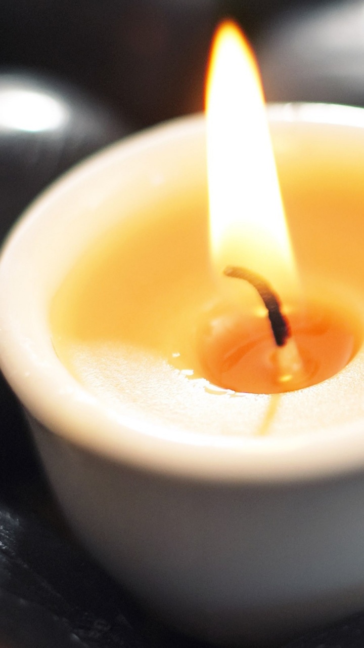 White Candle in White Ceramic Candle Holder. Wallpaper in 720x1280 Resolution
