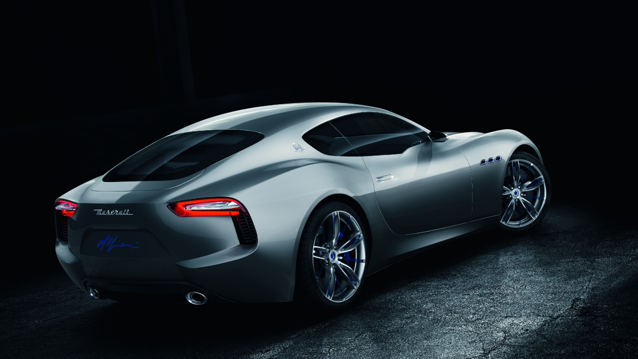 Silver Porsche 911 Parked on Black Surface. Wallpaper in 1280x720 Resolution