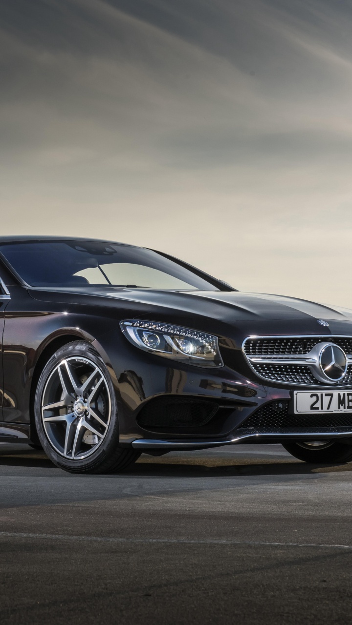 Black Mercedes Benz Coupe on Gray Asphalt Road. Wallpaper in 720x1280 Resolution