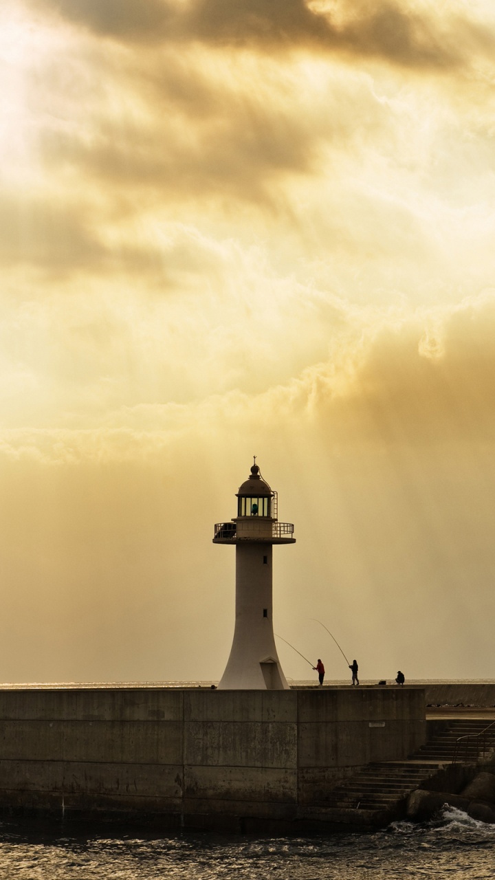 White and Black Lighthouse Near Body of Water During Daytime. Wallpaper in 720x1280 Resolution