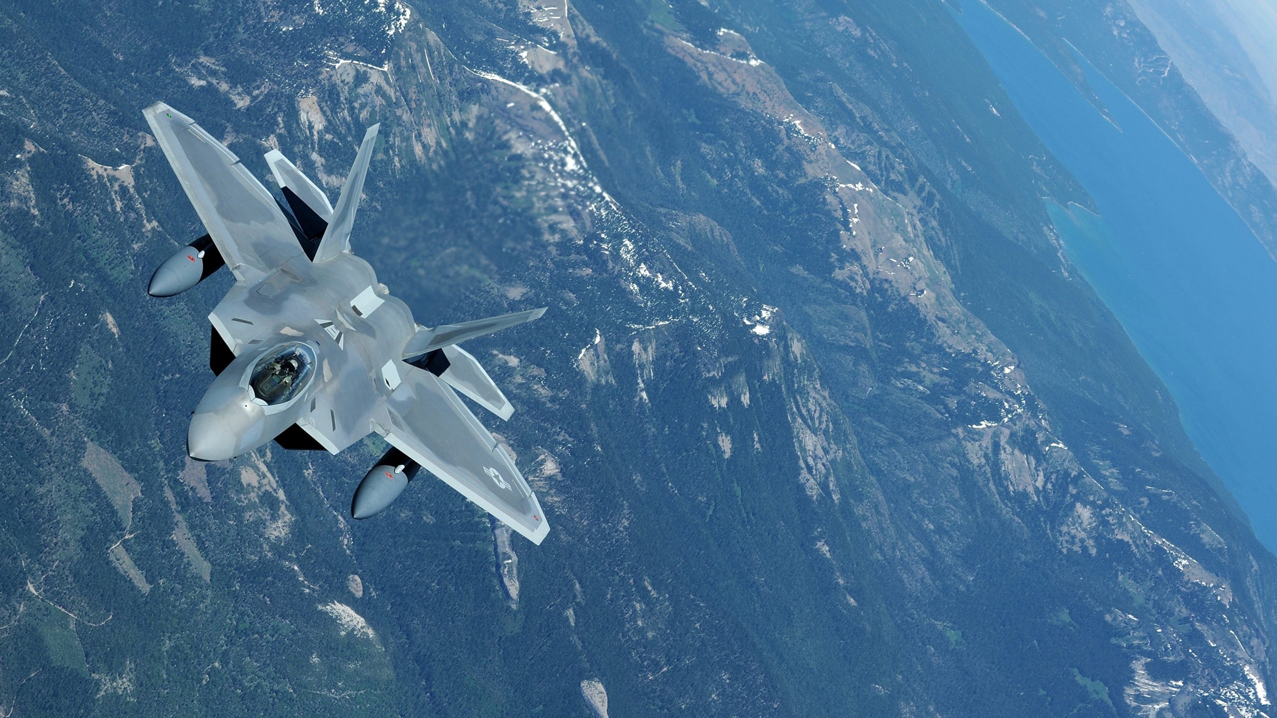 White Jet Plane Flying Over Blue and White Mountain. Wallpaper in 2560x1440 Resolution
