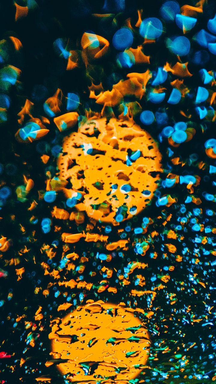 Yellow and Black Heart Shaped Lights. Wallpaper in 720x1280 Resolution