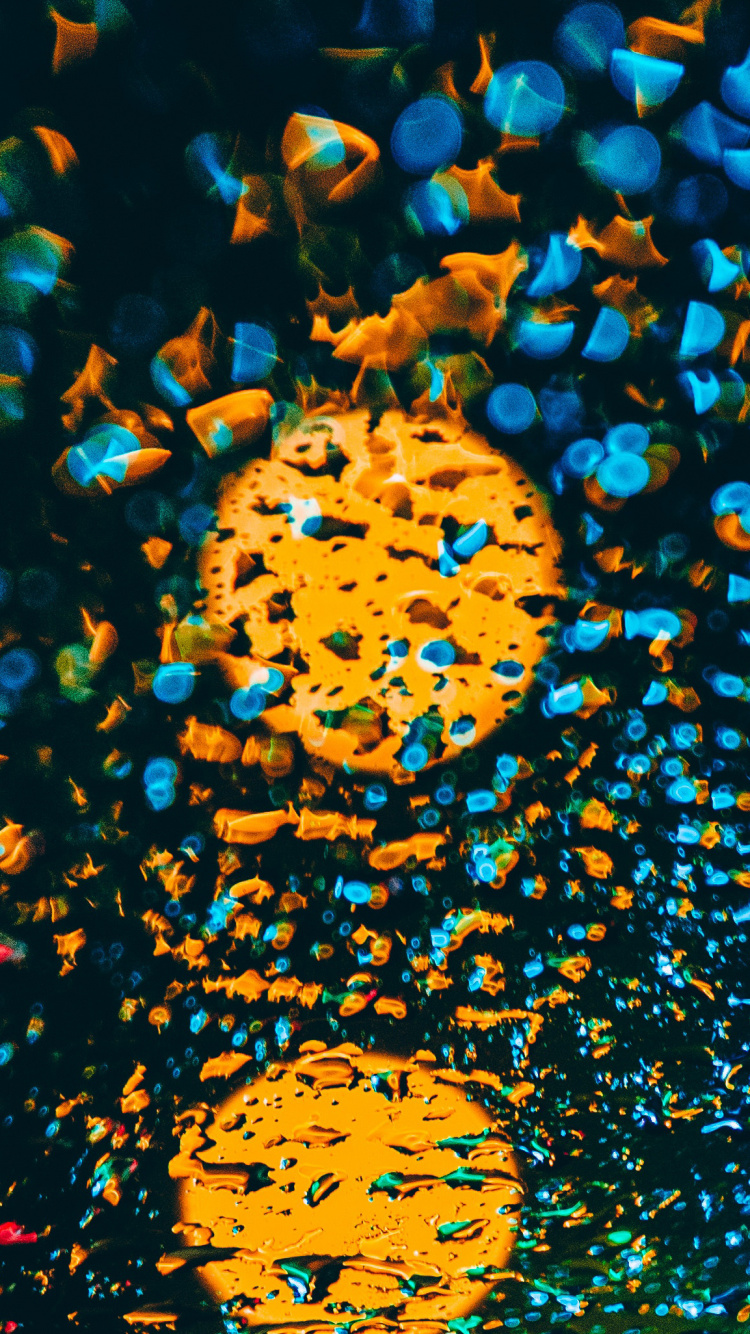 Yellow and Black Heart Shaped Lights. Wallpaper in 750x1334 Resolution