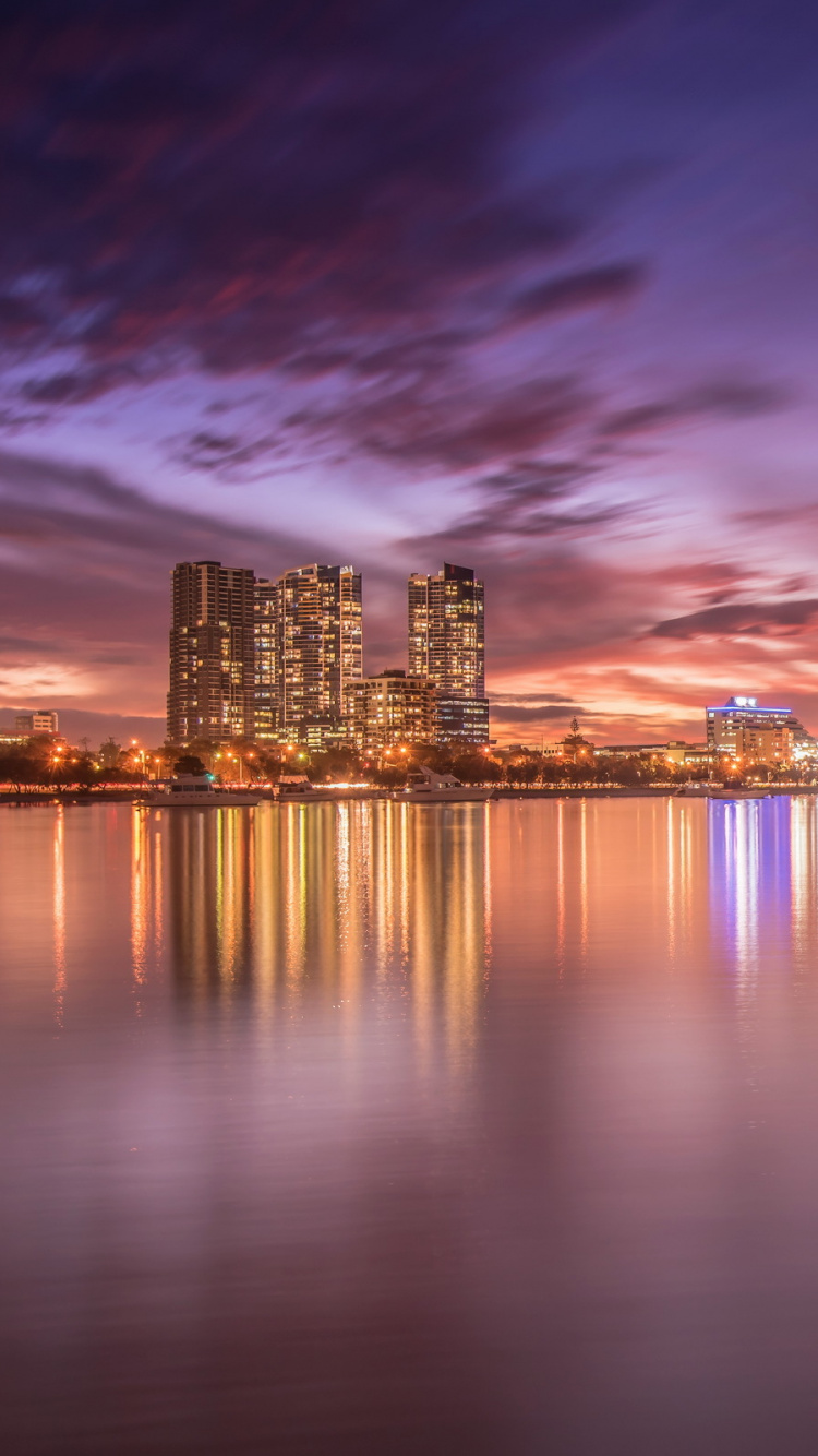 City Skyline During Night Time. Wallpaper in 750x1334 Resolution