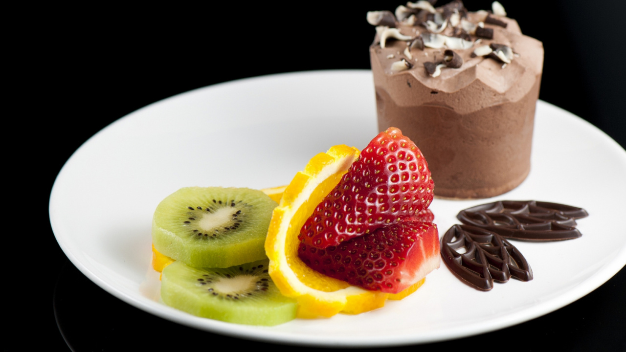 Sliced of Cake With Strawberry on White Ceramic Plate. Wallpaper in 1280x720 Resolution