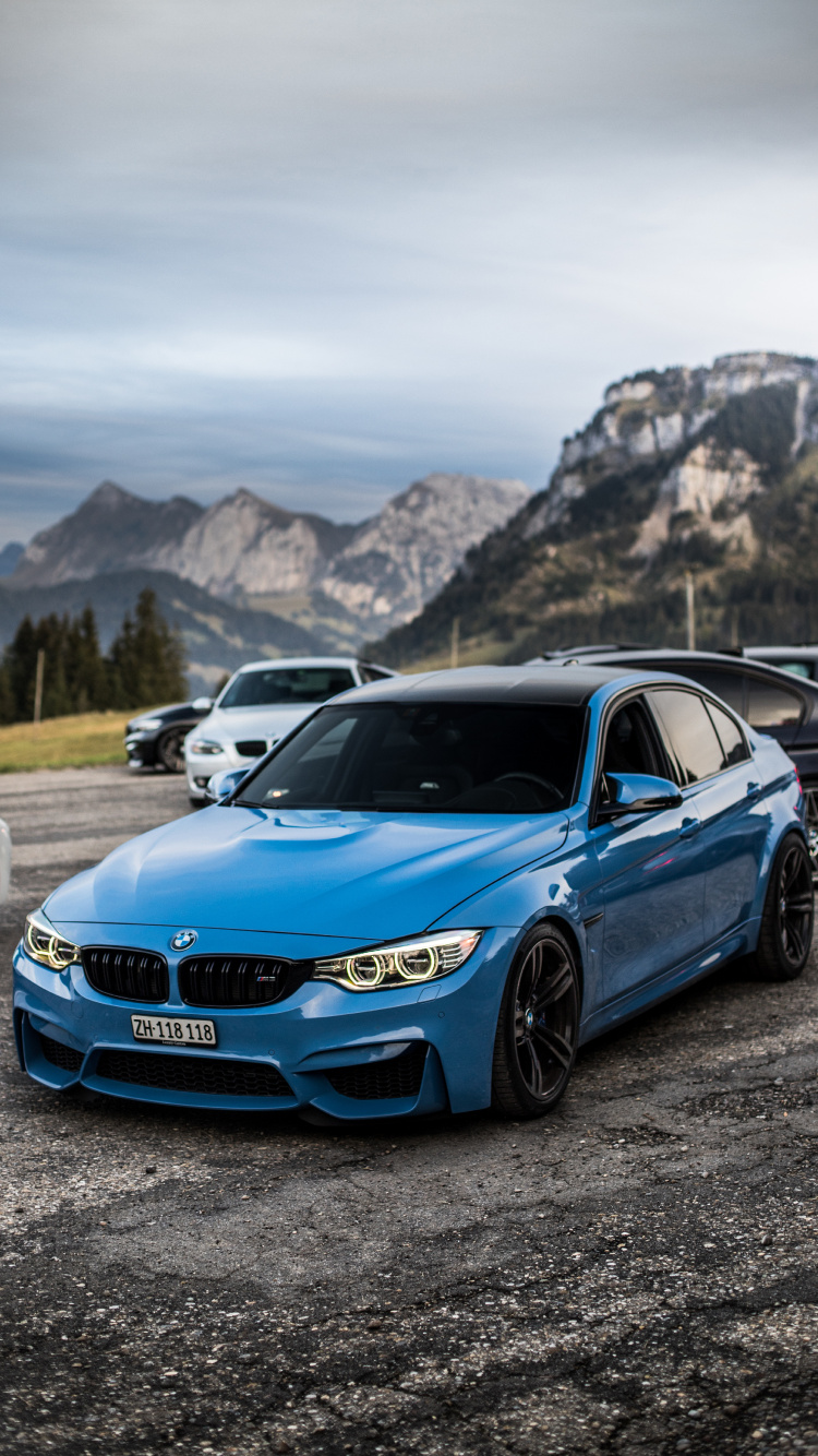 Blue Bmw m 3 on Road During Daytime. Wallpaper in 750x1334 Resolution