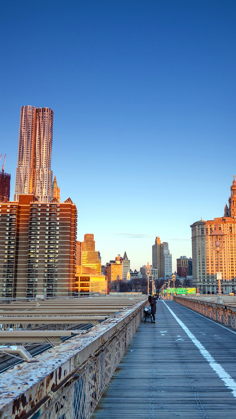 People Walking on Sidewalk Near High Rise Buildings During Daytime. Wallpaper in 750x1334 Resolution