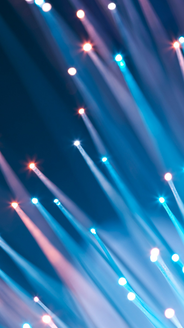 Blaues Und Weißes Licht in Einem Dunklen Raum. Wallpaper in 750x1334 Resolution