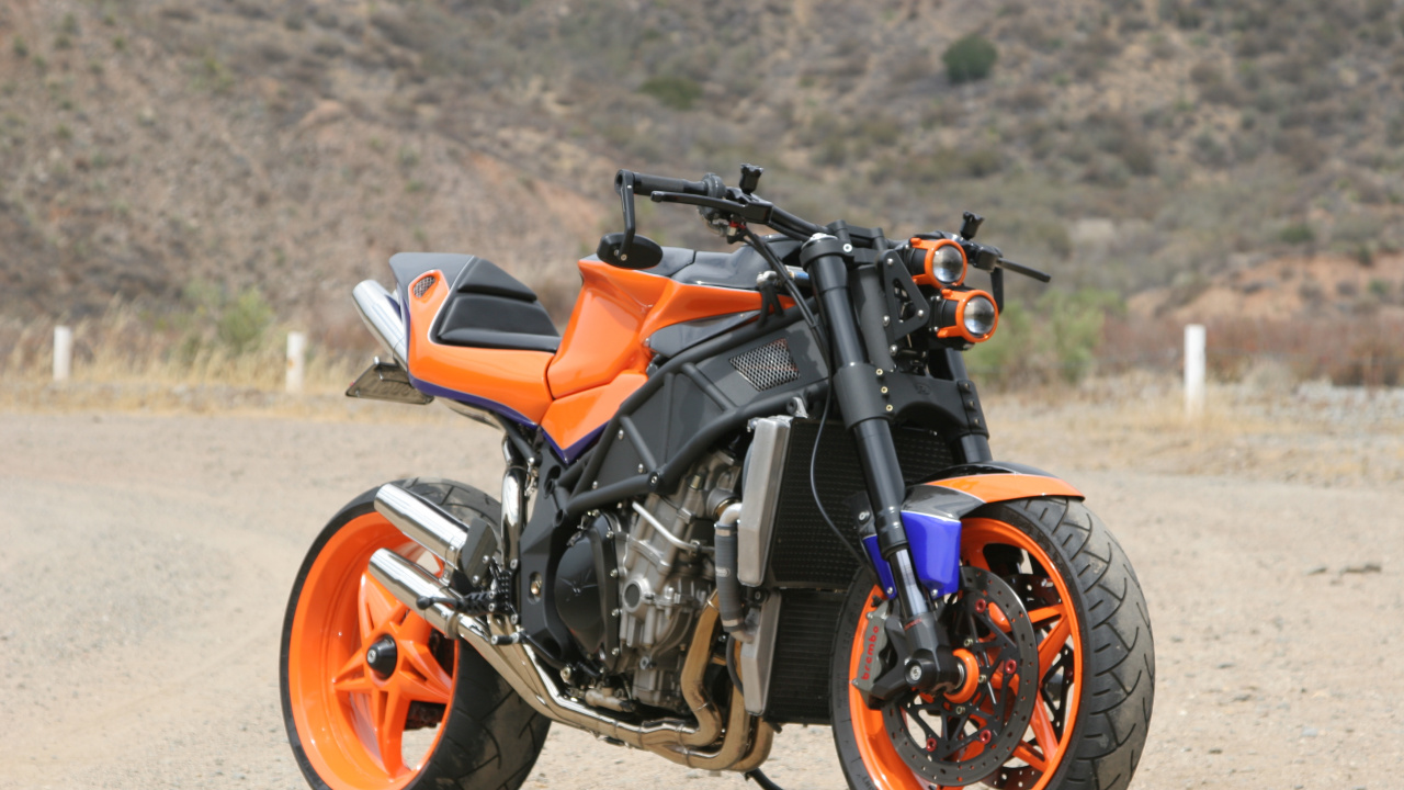 Orange and Black Motorcycle on Dirt Road During Daytime. Wallpaper in 1280x720 Resolution