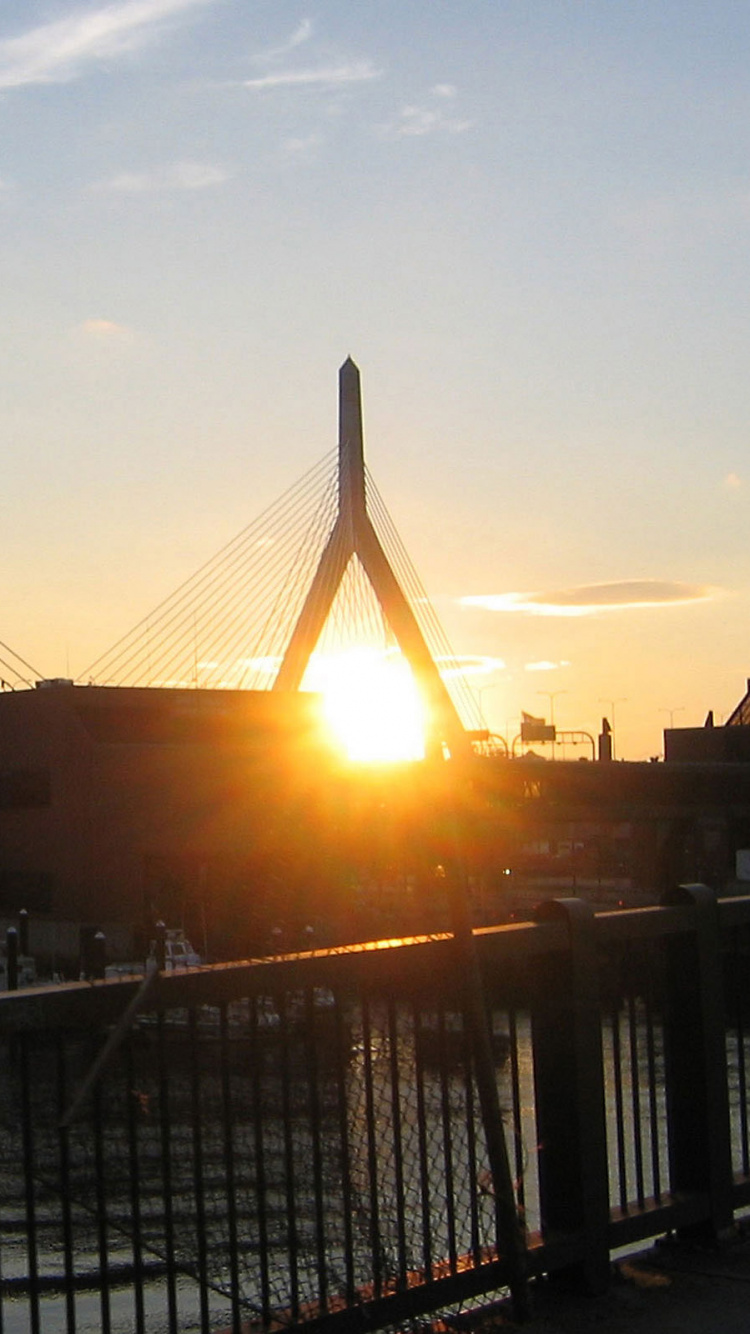White Ship on Sea Near Bridge During Sunset. Wallpaper in 750x1334 Resolution