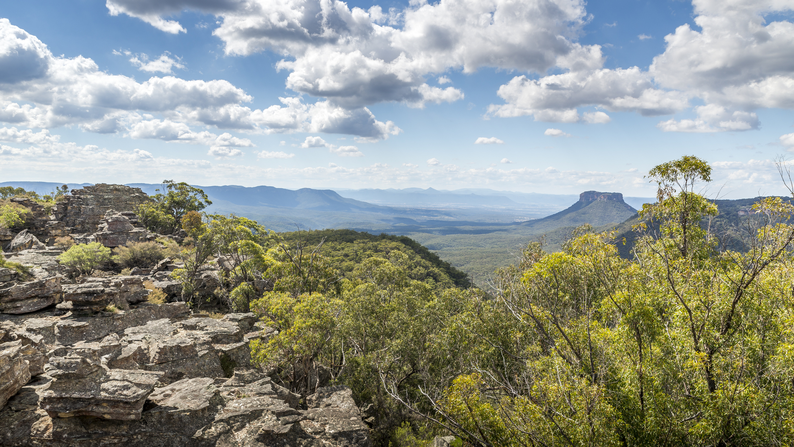 Green Trees on Mountain Under White Clouds and Blue Sky During Daytime. Wallpaper in 2560x1440 Resolution