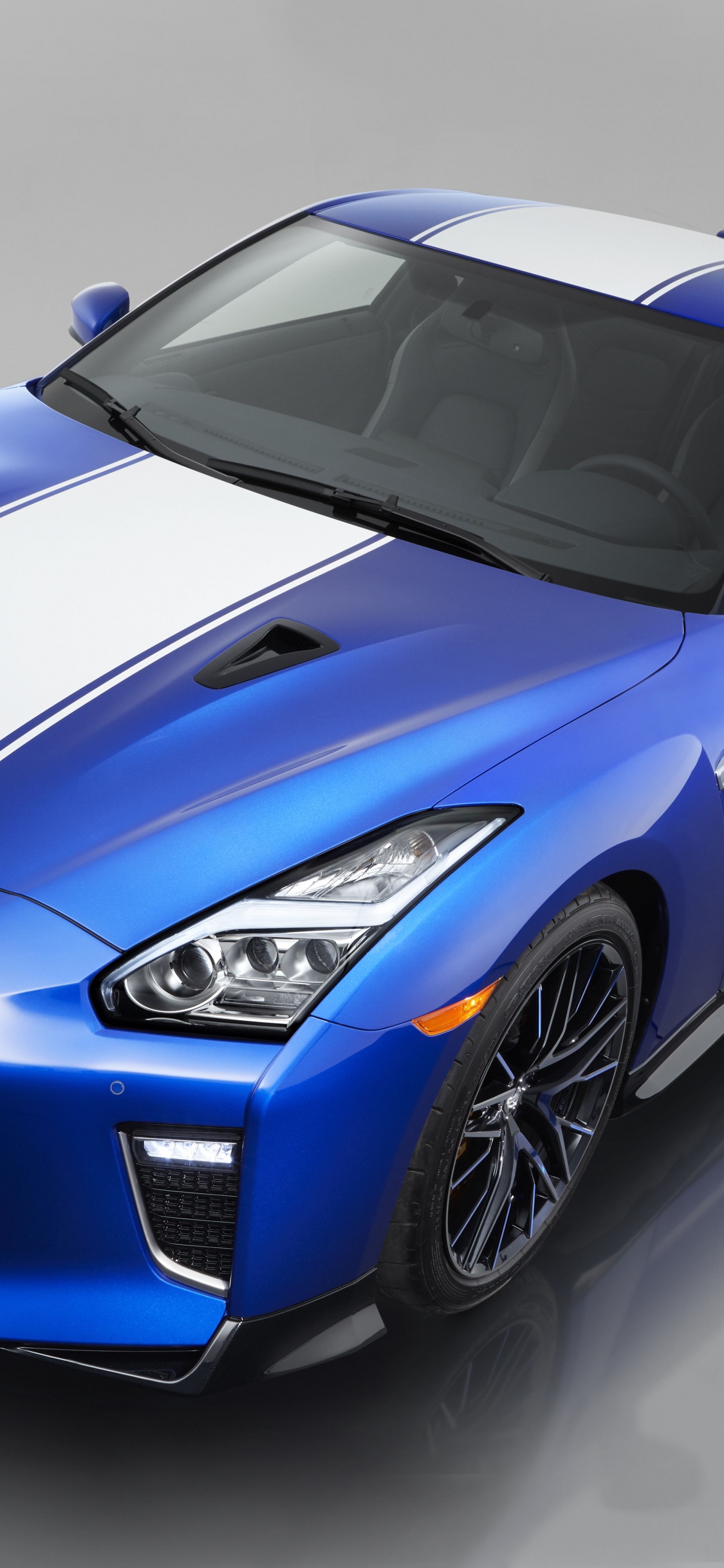 Blue and Black Lamborghini Aventador. Wallpaper in 1125x2436 Resolution
