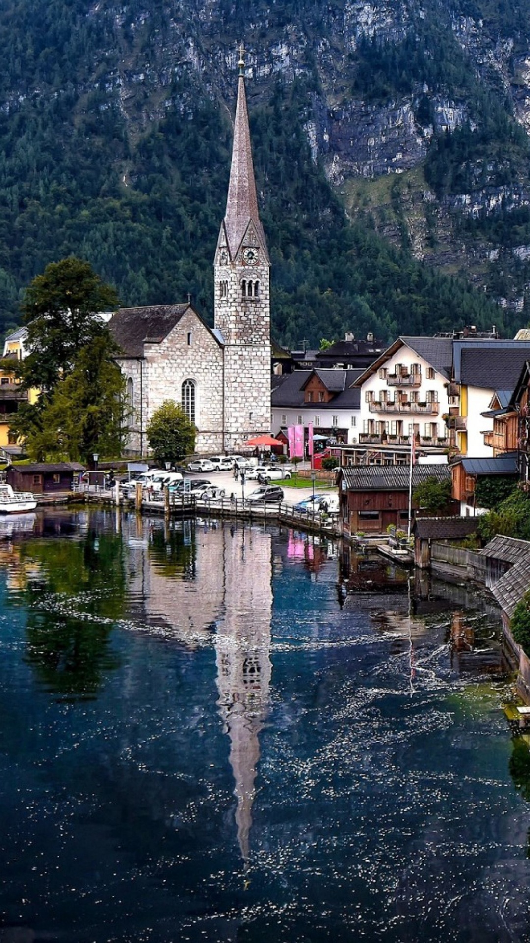 Brown and White Concrete Building Beside River During Daytime. Wallpaper in 1080x1920 Resolution
