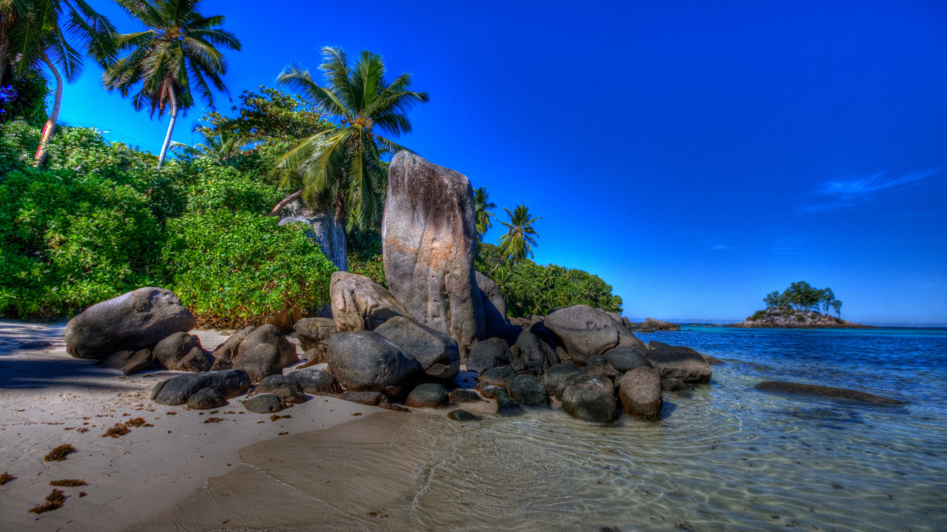 Gray and Brown Rock Formation on Sea Shore During Daytime. Wallpaper in 1366x768 Resolution