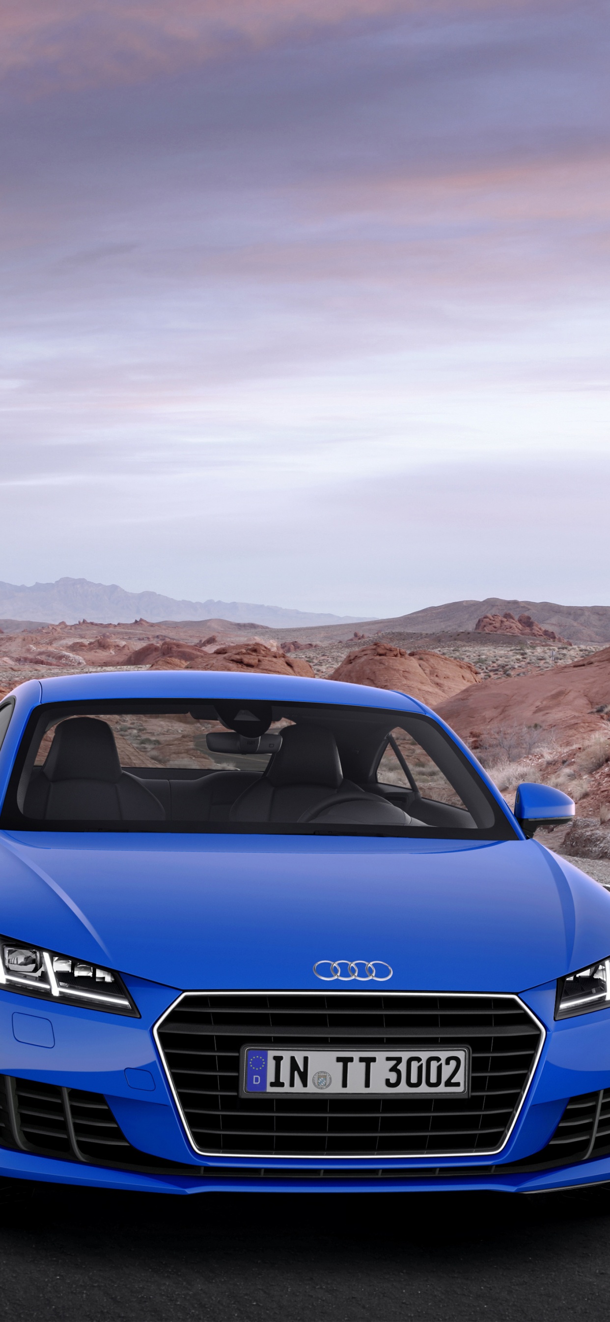 Audi a 4 Azul en la Carretera Durante el Día. Wallpaper in 1242x2688 Resolution