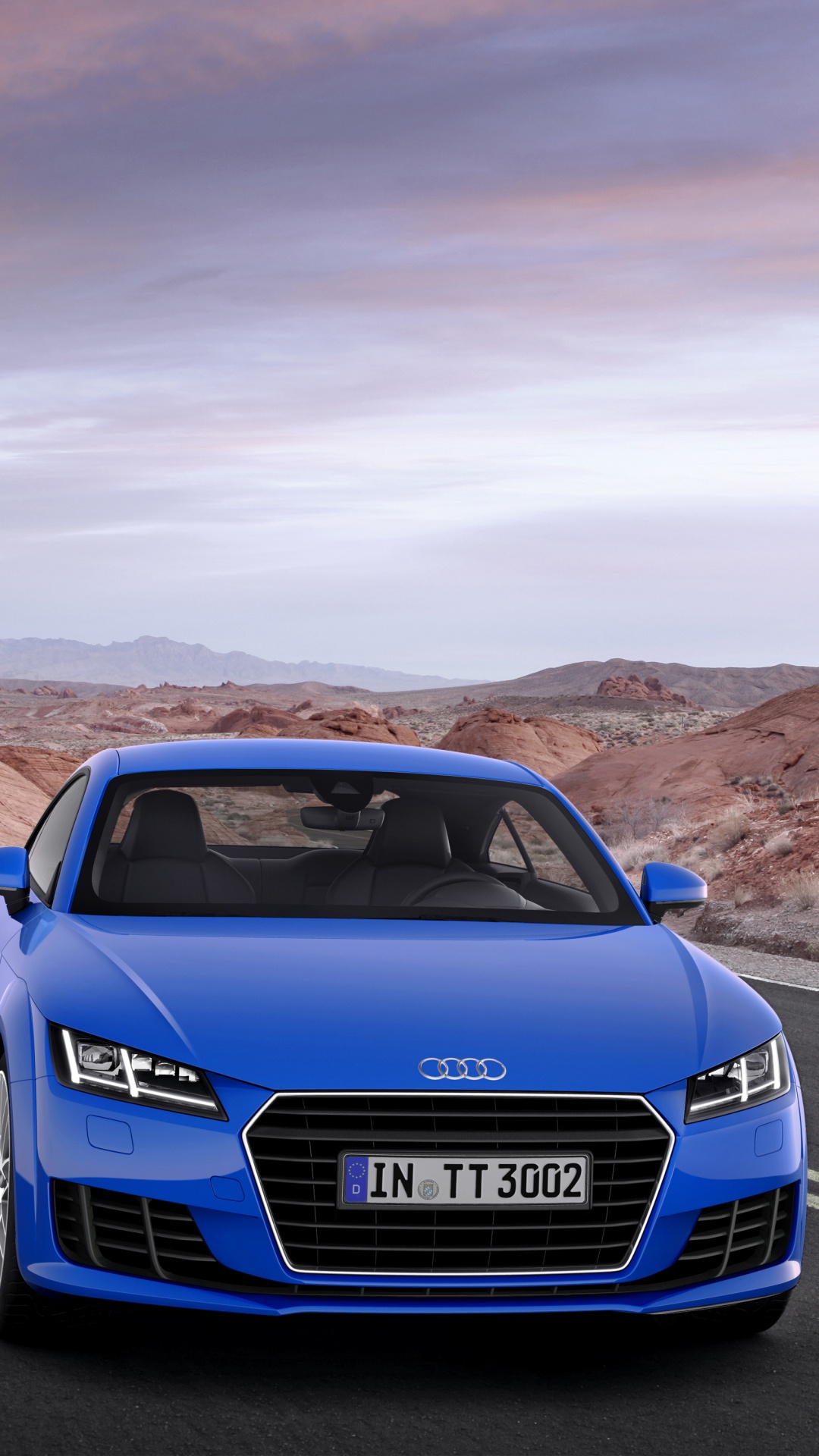Blauer Audi a 4 Tagsüber Unterwegs. Wallpaper in 1080x1920 Resolution