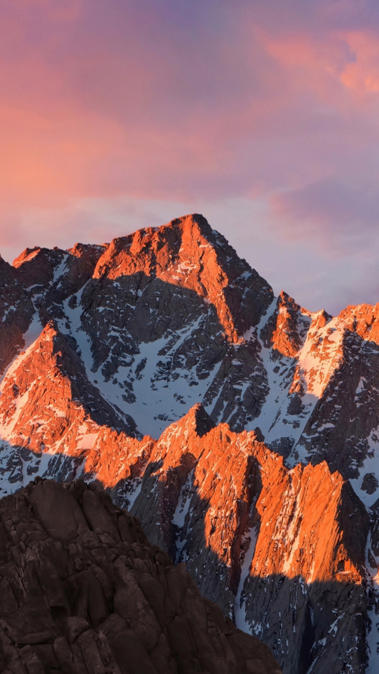 Snow Covered Mountain Under Cloudy Sky During Daytime. Wallpaper in 750x1334 Resolution