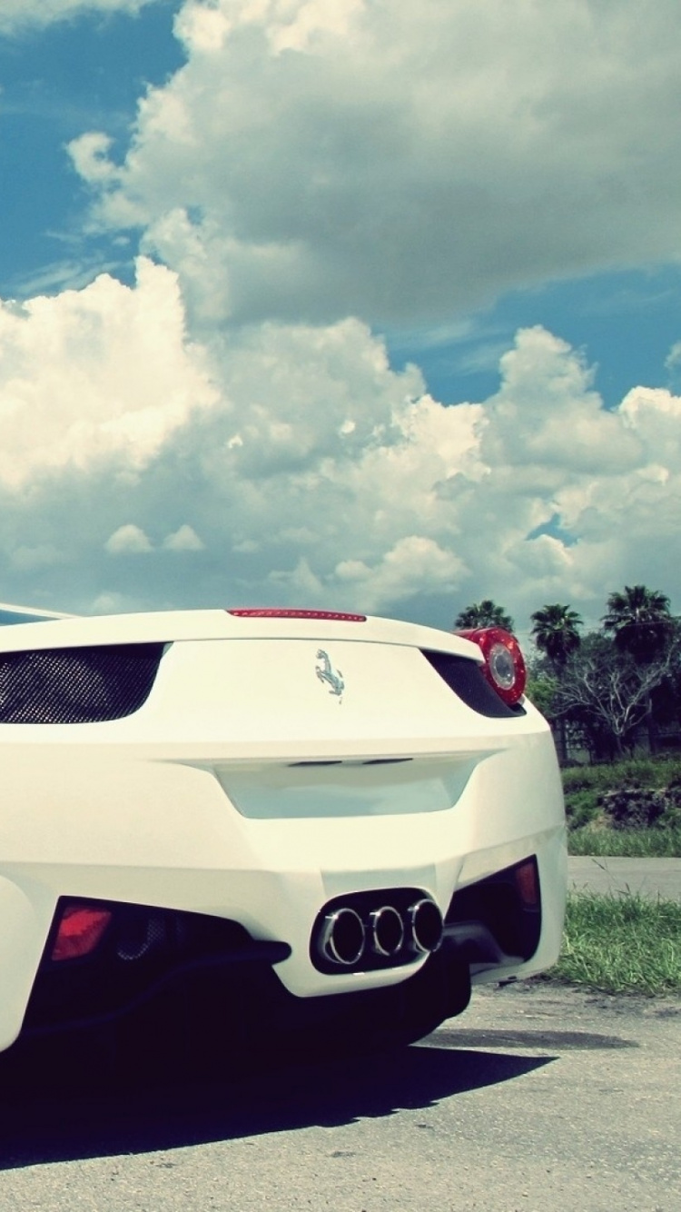 White Porsche 911 on Road Under White Clouds and Blue Sky During Daytime. Wallpaper in 750x1334 Resolution