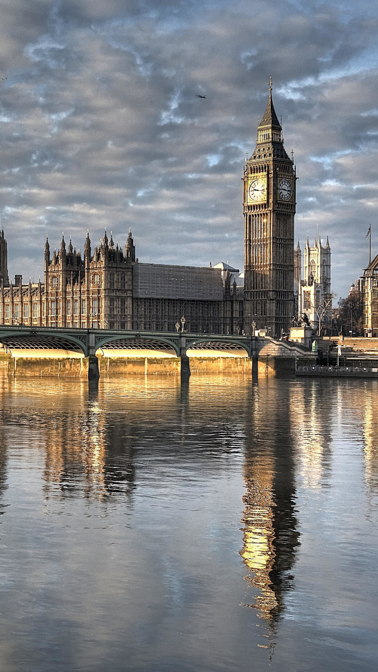 Brown Concrete Bridge Over River During Daytime. Wallpaper in 750x1334 Resolution