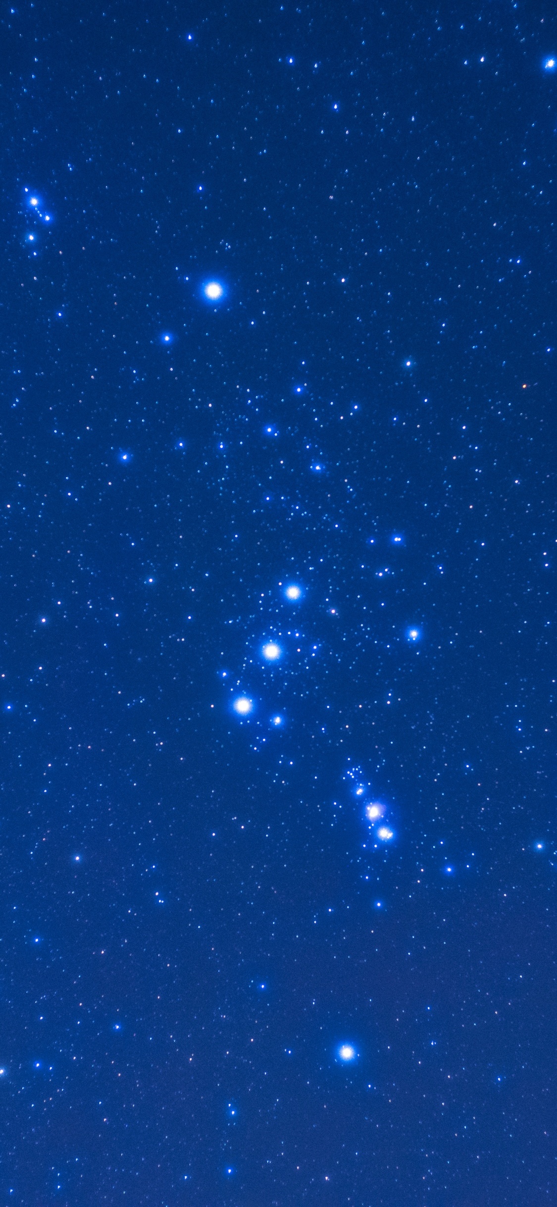 Estrellas Azules y Blancas en el Cielo Azul. Wallpaper in 1125x2436 Resolution