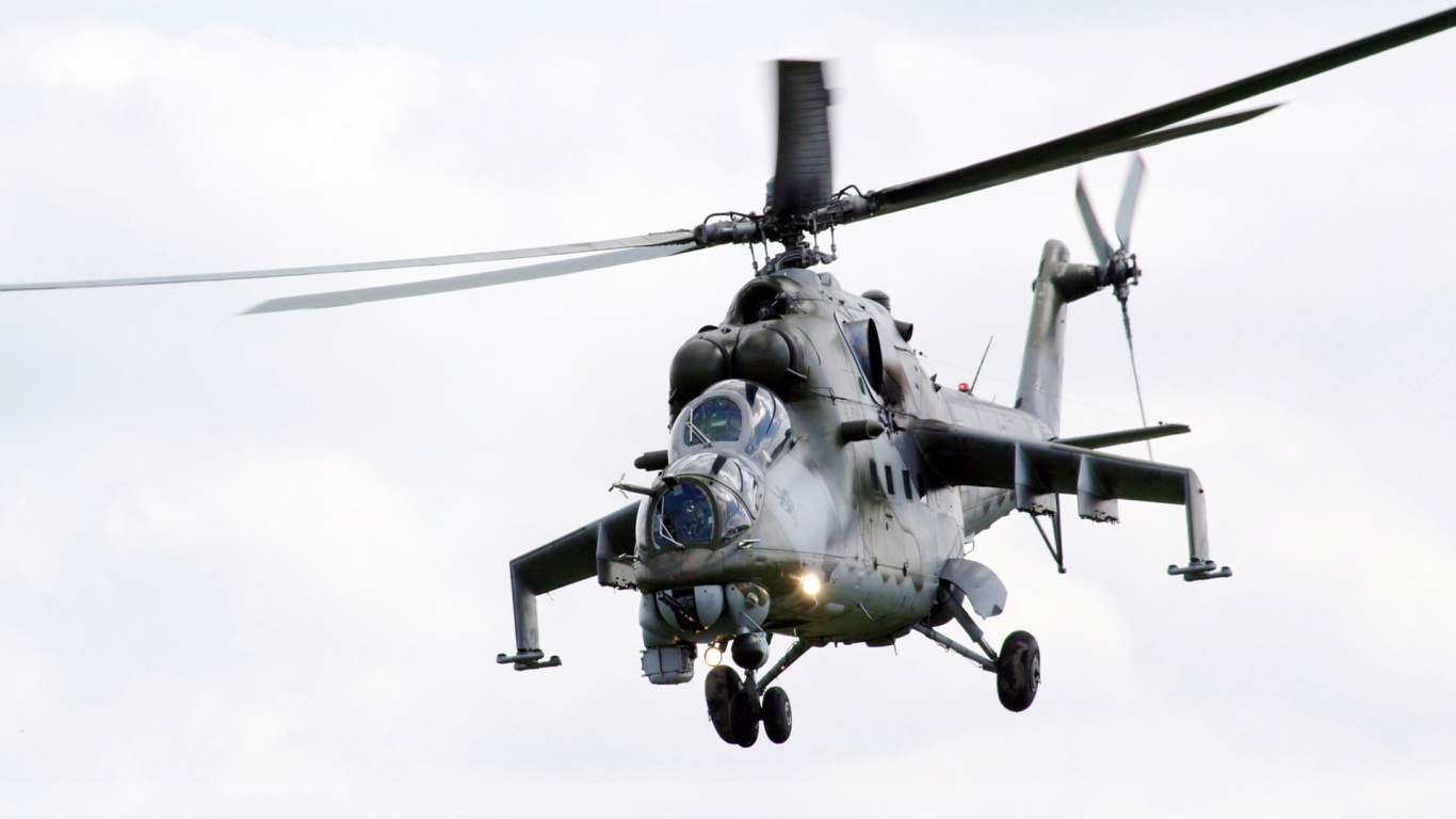 Schwarz-graues Kampfflugzeug am Himmel. Wallpaper in 1366x768 Resolution