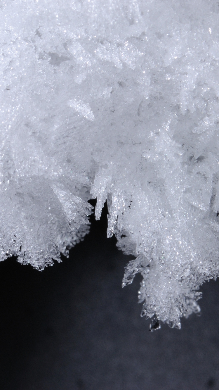 White Powder on Black Surface. Wallpaper in 750x1334 Resolution