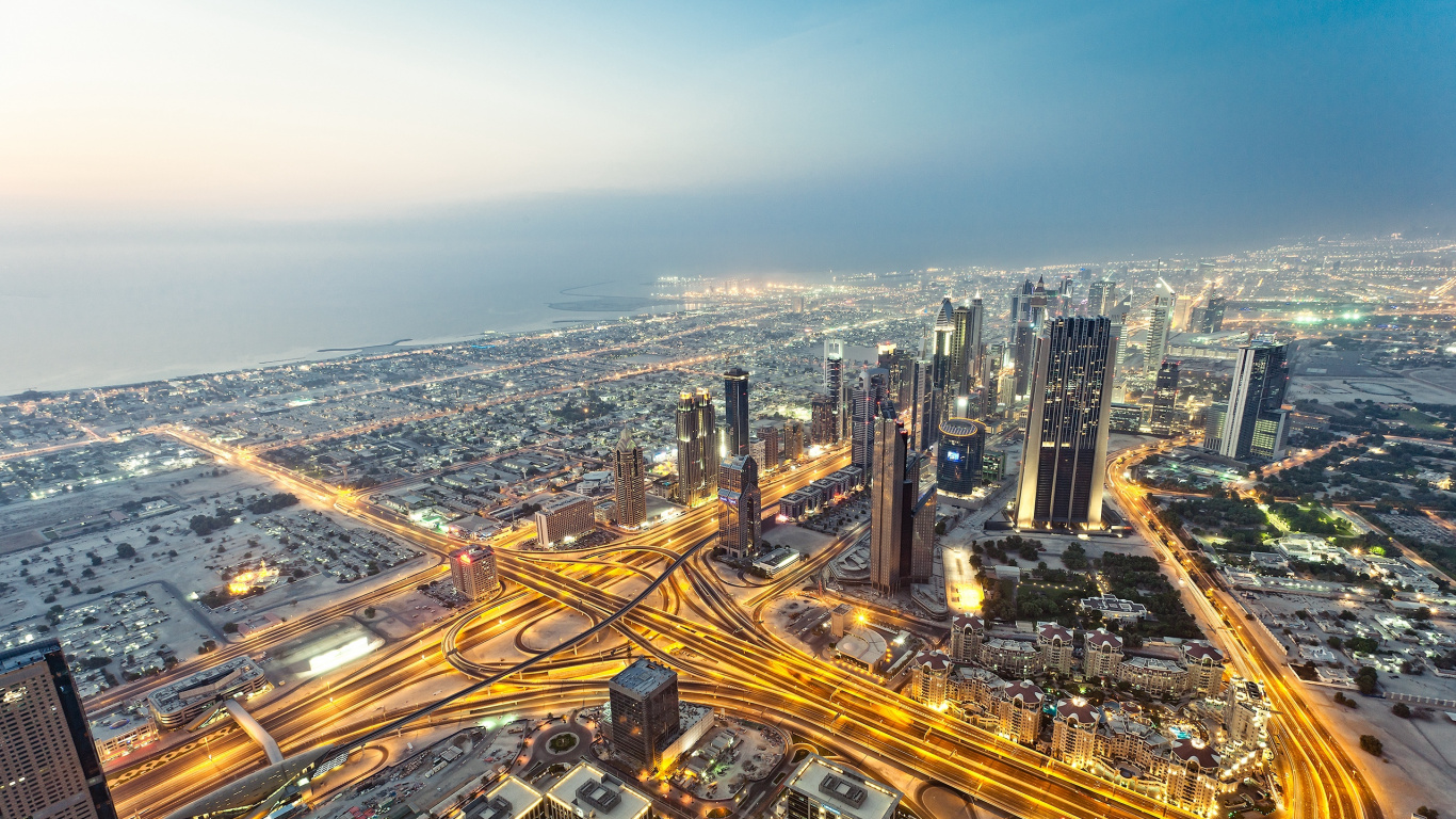Aerial View of City Buildings During Night Time. Wallpaper in 1366x768 Resolution
