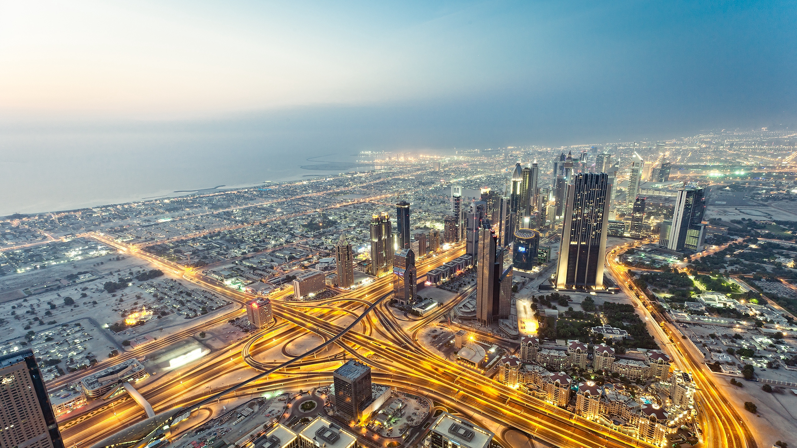 Aerial View of City Buildings During Night Time. Wallpaper in 2560x1440 Resolution