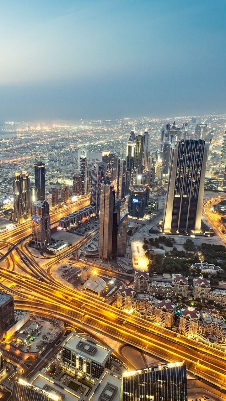 Aerial View of City Buildings During Night Time. Wallpaper in 720x1280 Resolution