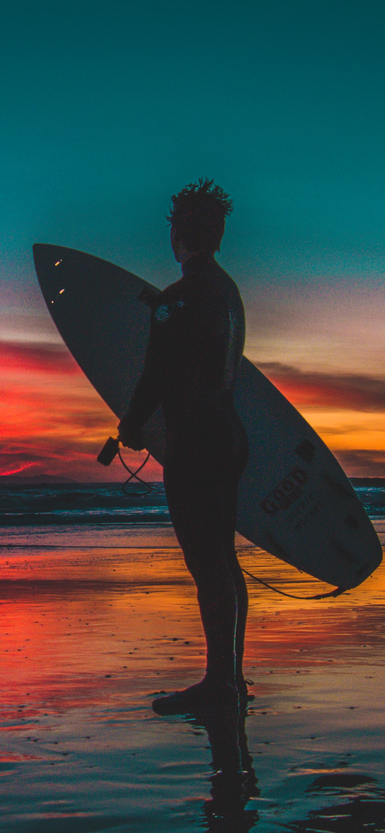 Silhouette of Woman Holding Surfboard on Beach During Sunset. Wallpaper in 1242x2688 Resolution