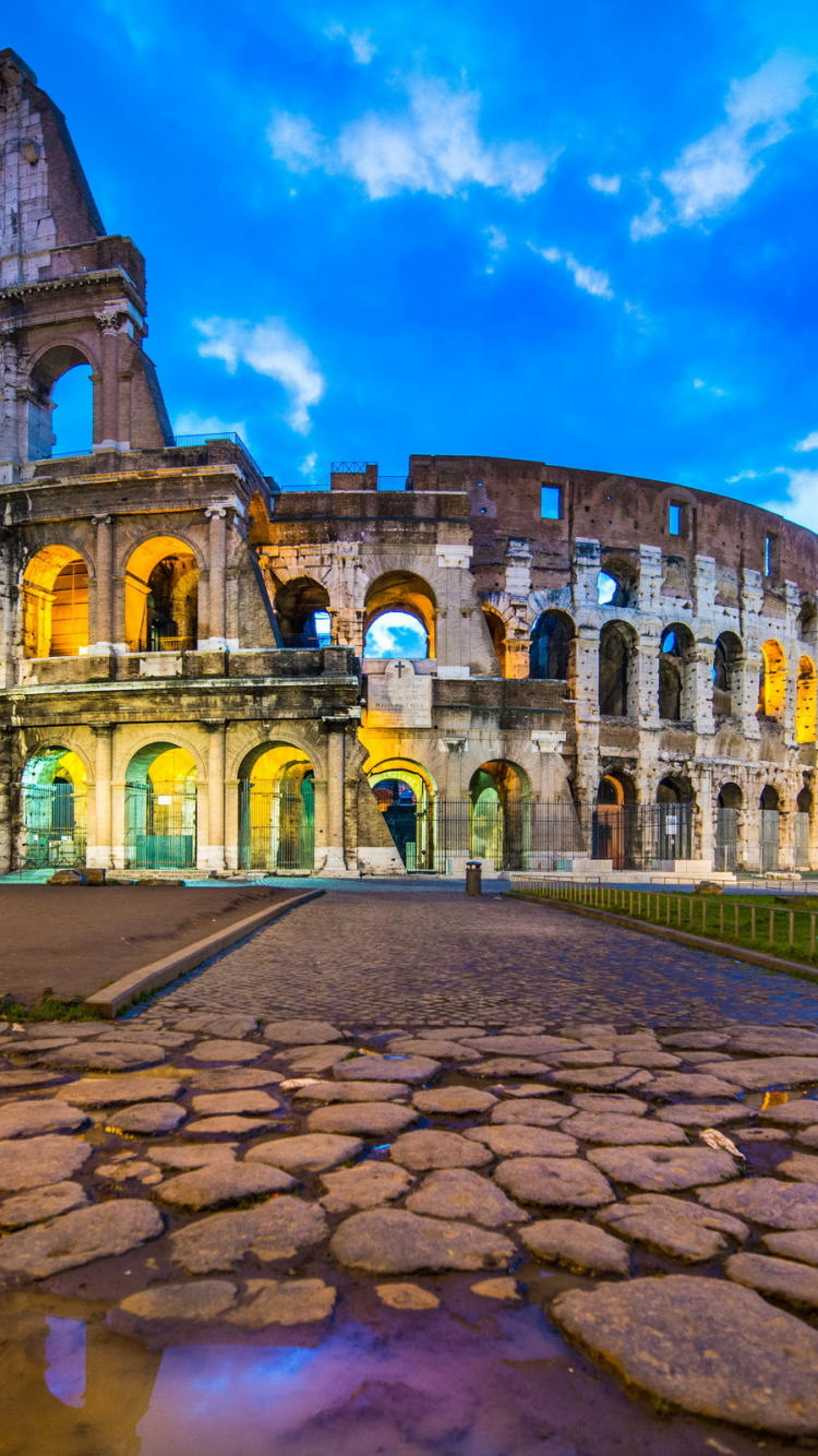 Edificio de Hormigón Marrón Bajo un Cielo Azul Durante el Día. Wallpaper in 750x1334 Resolution
