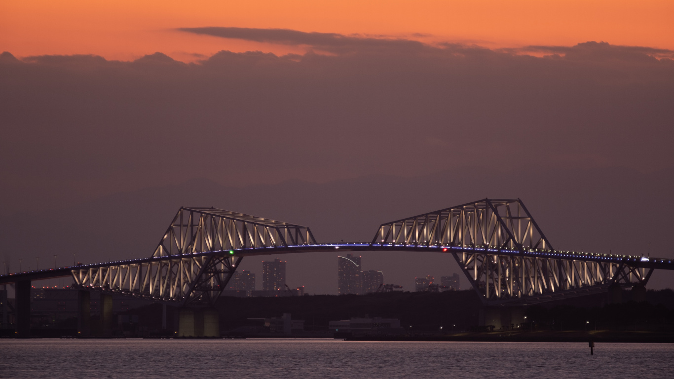 White Metal Bridge Over The Sea During Sunset. Wallpaper in 1366x768 Resolution