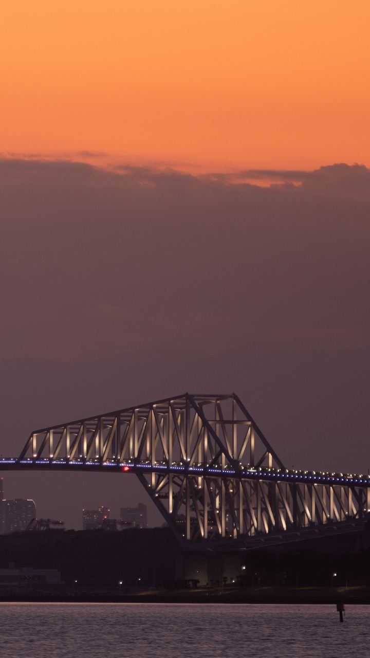 White Metal Bridge Over The Sea During Sunset. Wallpaper in 720x1280 Resolution