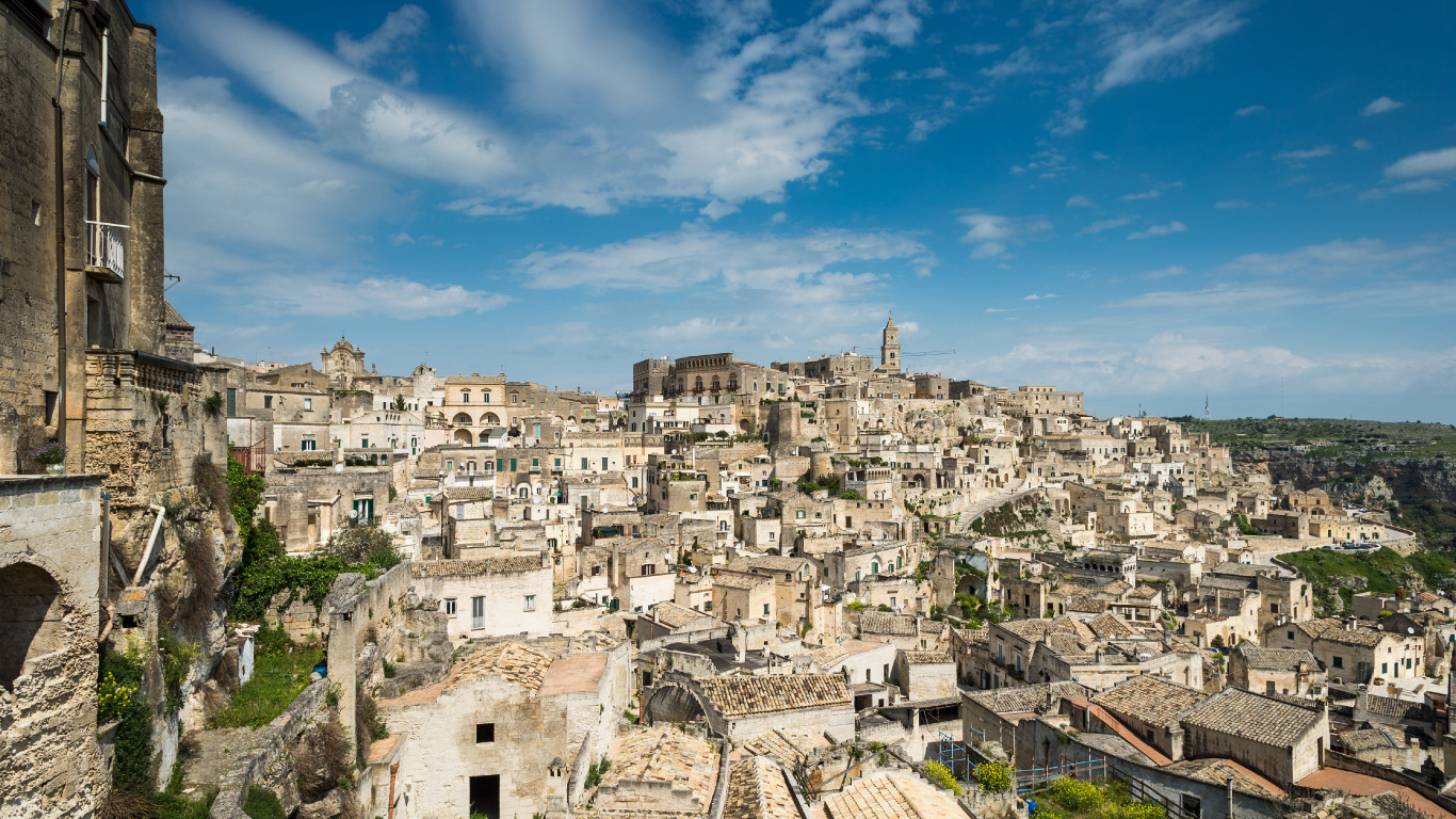 White Concrete Buildings Under Blue Sky During Daytime. Wallpaper in 1366x768 Resolution