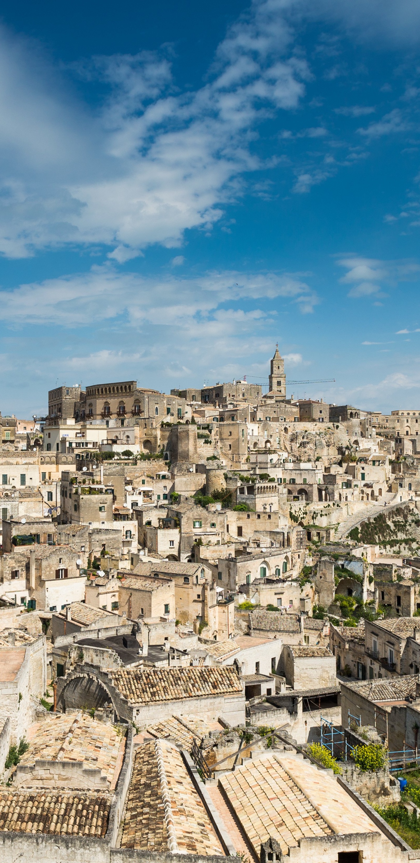 White Concrete Buildings Under Blue Sky During Daytime. Wallpaper in 1440x2960 Resolution