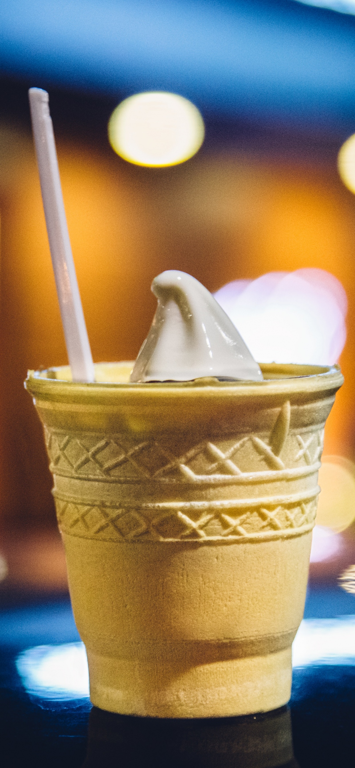 Brown and White Disposable Cup With Ice Cream on Top. Wallpaper in 1242x2688 Resolution