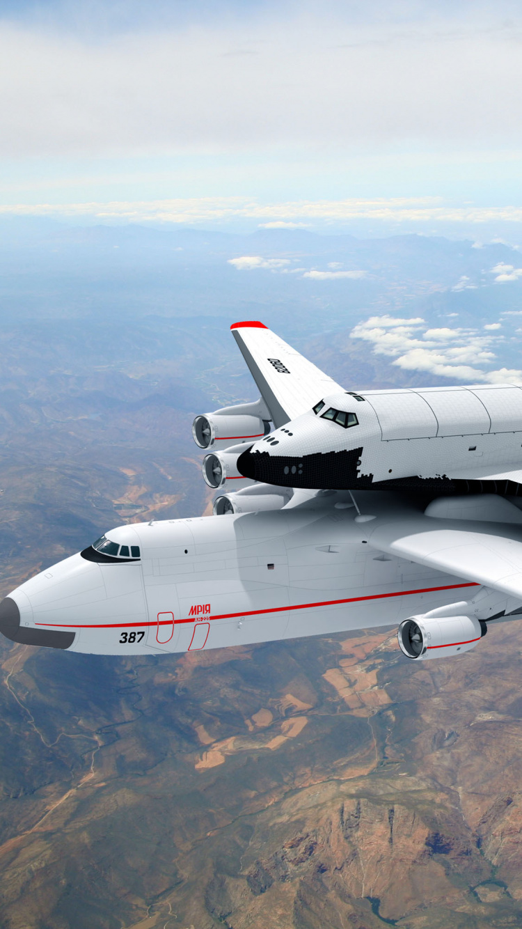 White and Red Airplane on Top of Brown Mountain During Daytime. Wallpaper in 750x1334 Resolution
