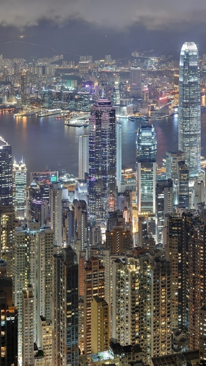 Vue Aérienne Des Bâtiments de la Ville Pendant la Nuit. Wallpaper in 720x1280 Resolution