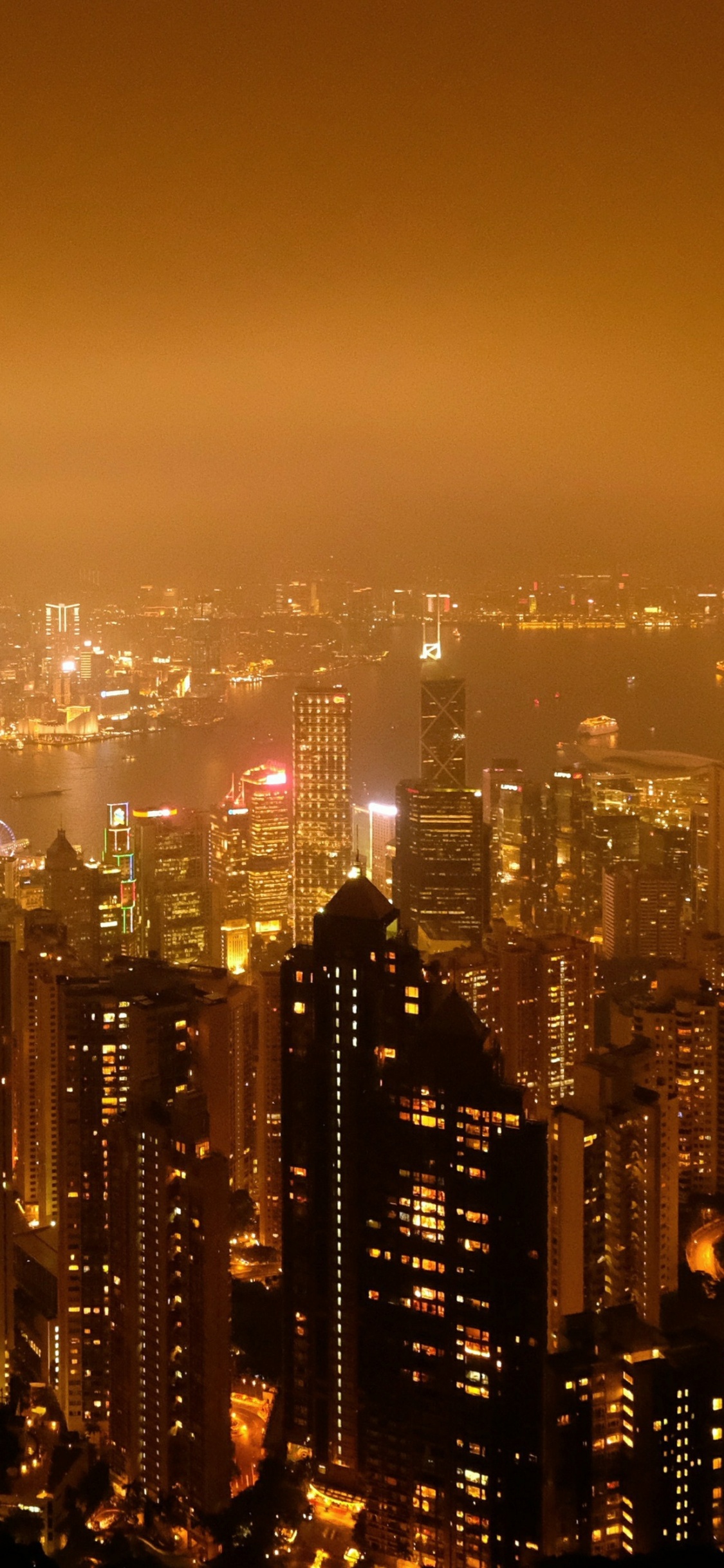 Horizon de la Ville Pendant la Nuit. Wallpaper in 1125x2436 Resolution