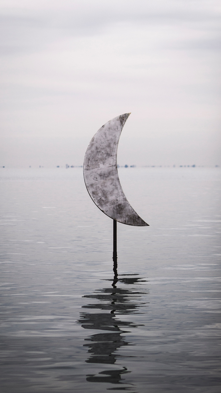 White Umbrella on Body of Water. Wallpaper in 750x1334 Resolution