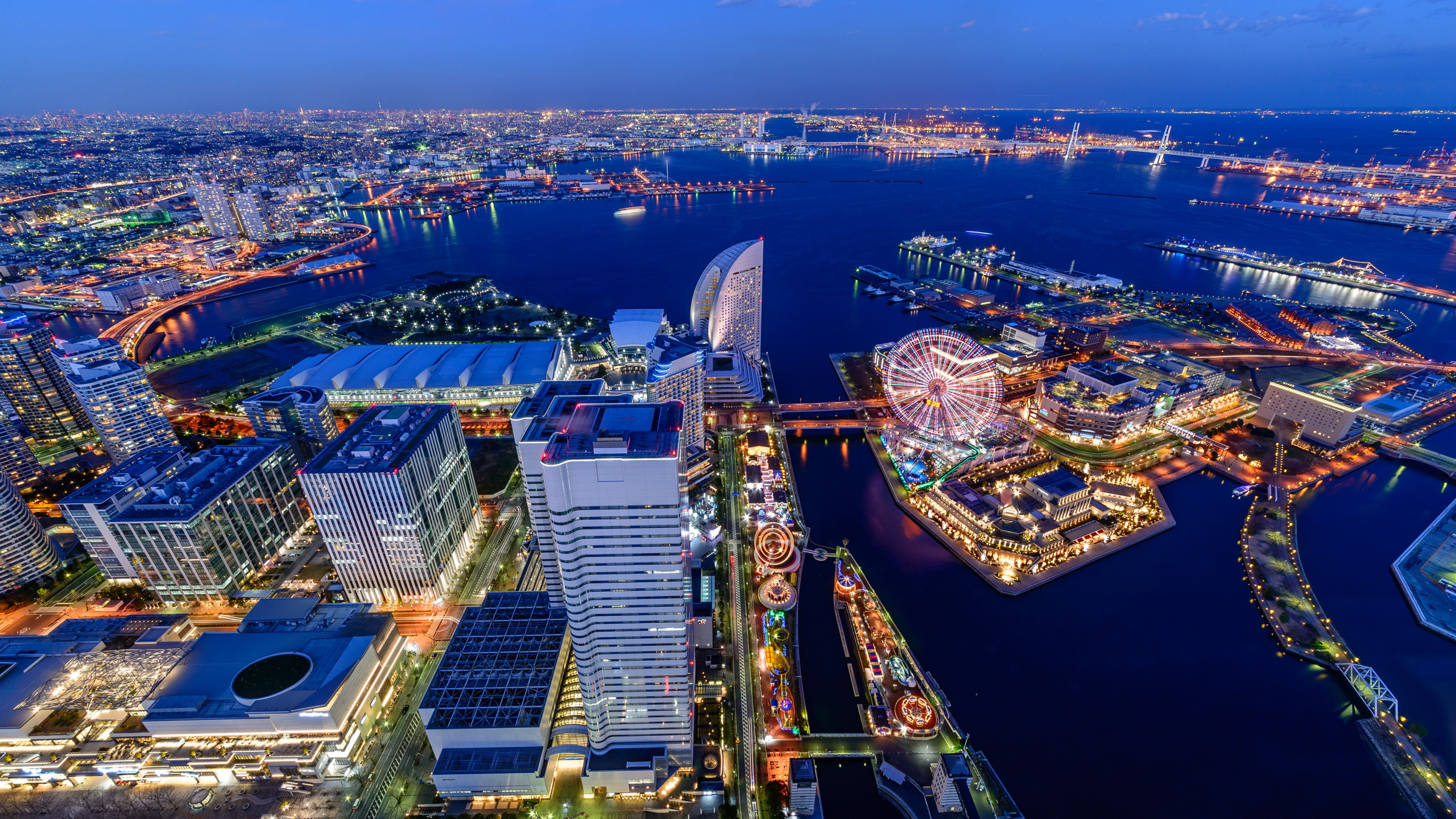 Aerial View of City Buildings During Night Time. Wallpaper in 2560x1440 Resolution