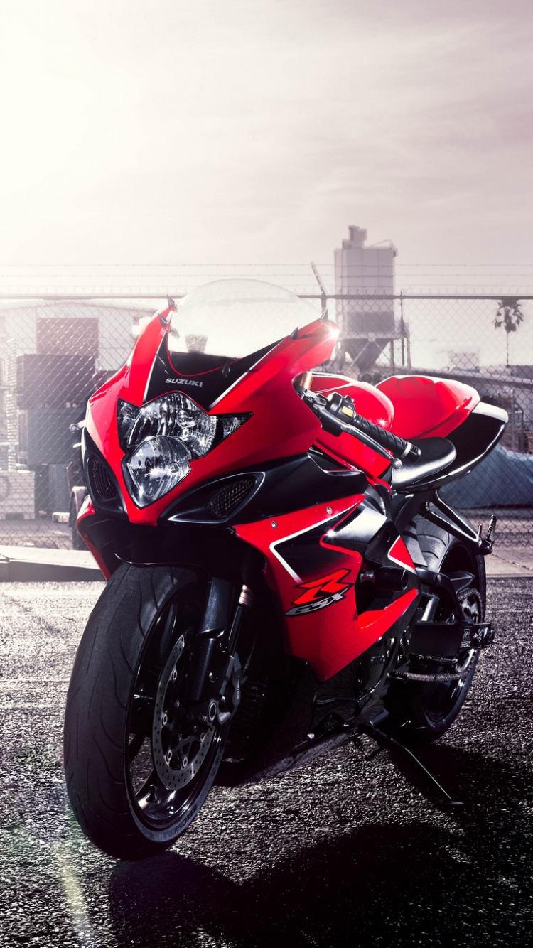 Red and Black Sports Bike on Gray Field During Daytime. Wallpaper in 750x1334 Resolution