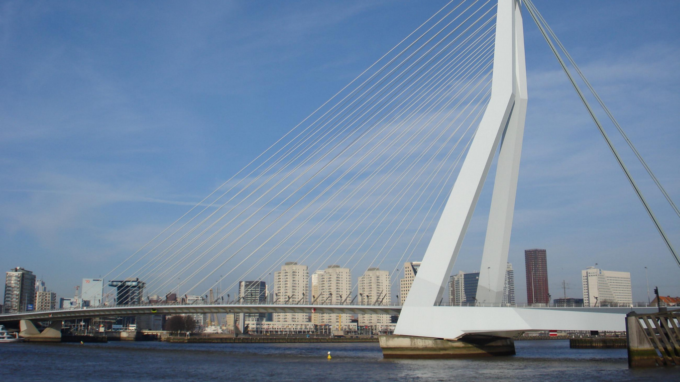 White Bridge Over Body of Water During Daytime. Wallpaper in 1366x768 Resolution