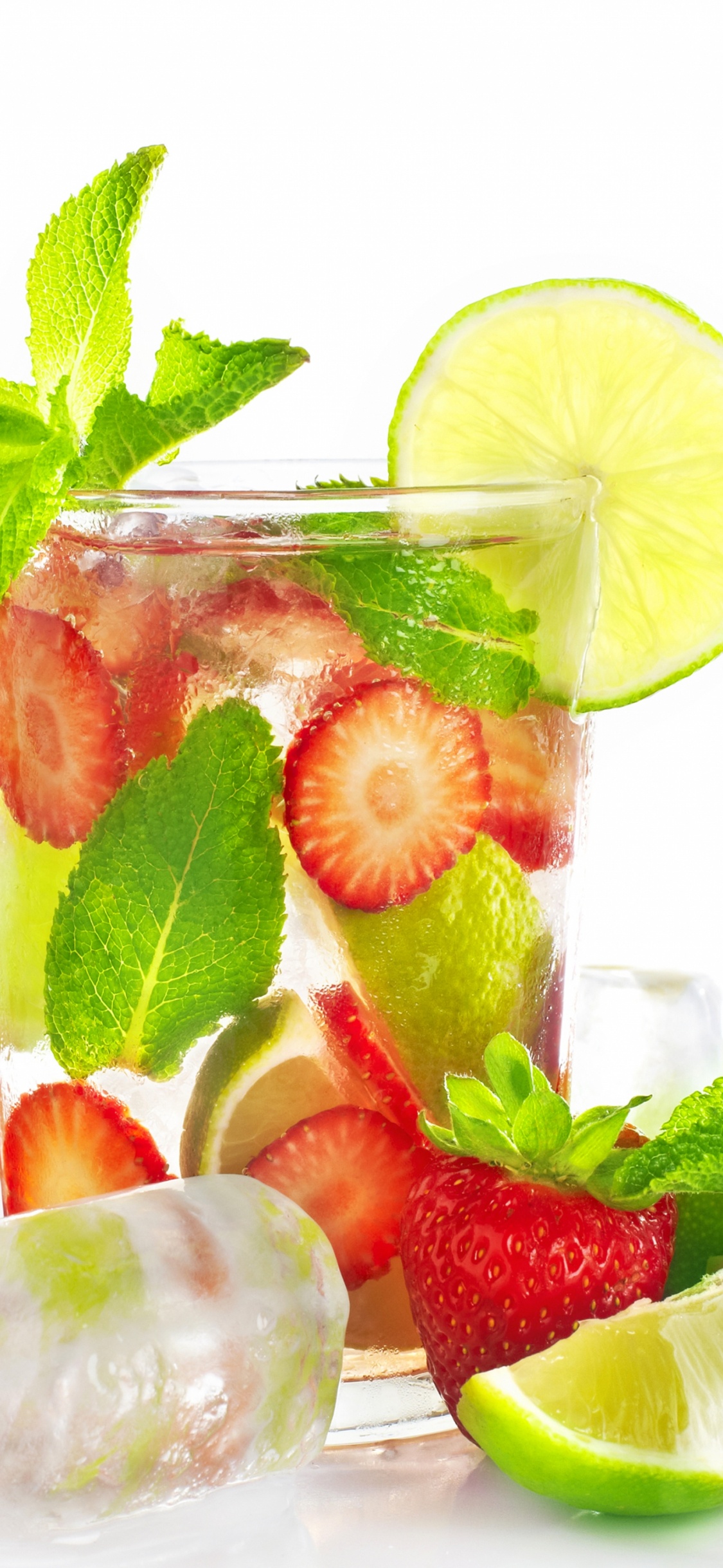 Sliced Strawberries and Green Leaves in Clear Glass Jar. Wallpaper in 1125x2436 Resolution