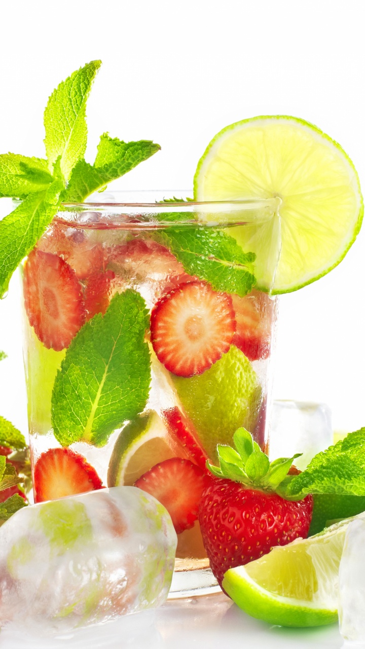 Sliced Strawberries and Green Leaves in Clear Glass Jar. Wallpaper in 720x1280 Resolution