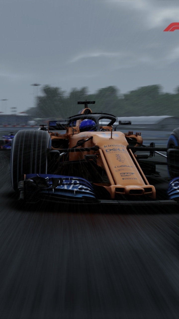 Amarillo y Negro f 1 en la Carretera Durante el Día. Wallpaper in 720x1280 Resolution